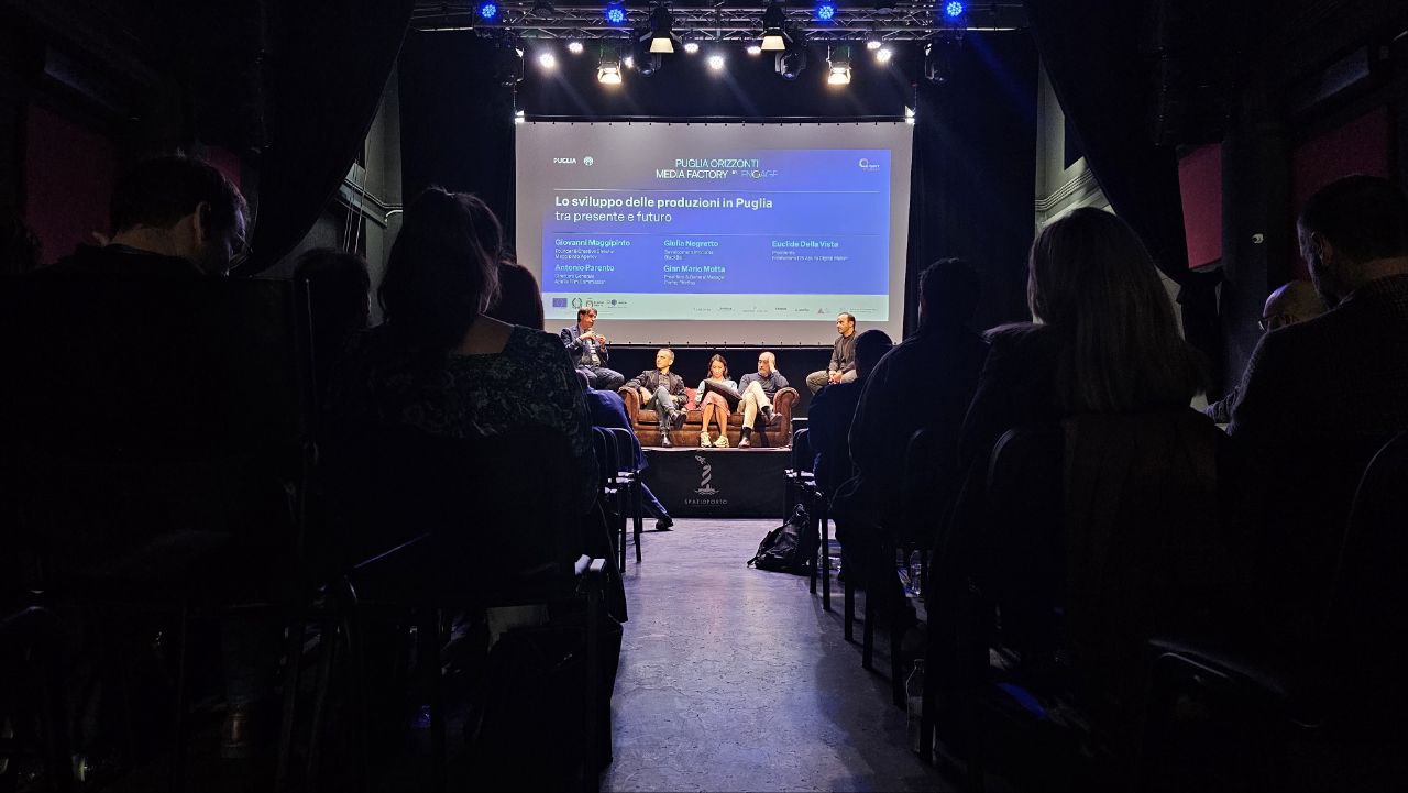 Puglia Orizzonti panel on stage at Spazioporto, Taranto